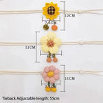 rubans rideaux fleurs relief rose clair jaune beige pompons clips métalliques