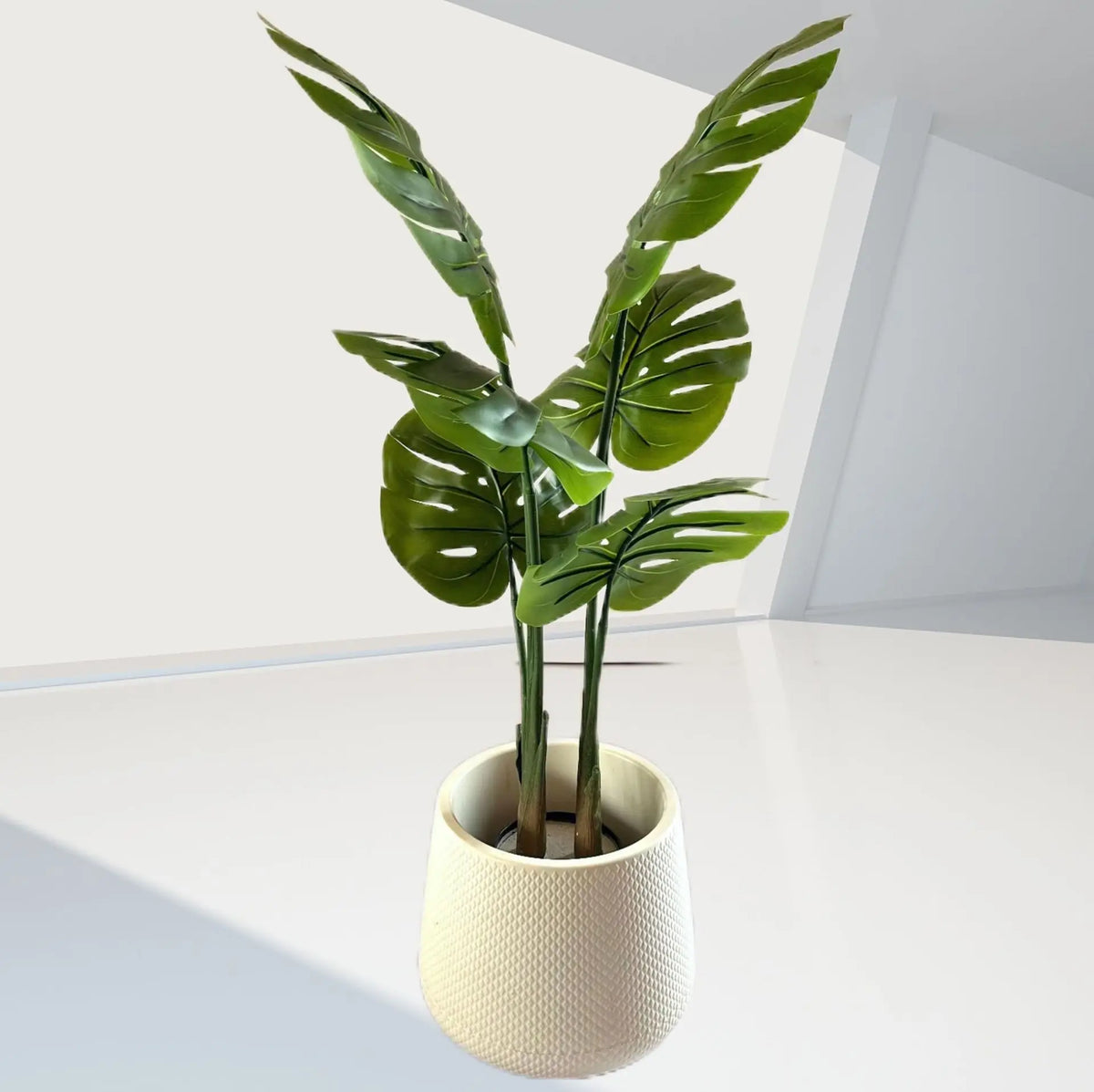plantes artificielles vertes feuilles grandes moderne pot support métallique exposition extérieure