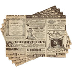Set de 4 sets de table lavables motif vieux journal français sur table à manger