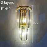 applique murale moderne cristal doré tubes horizontaux lumière led salon luxe élégant
