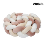 coussin noué bébé tissu doux texture tressée beige clair moderne confortable sécurité chambre anti
