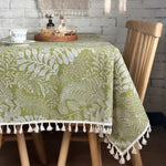 nappe verte feuilles stylisées broderie fine tassellets blancs restaurant pique nique mariage printemps