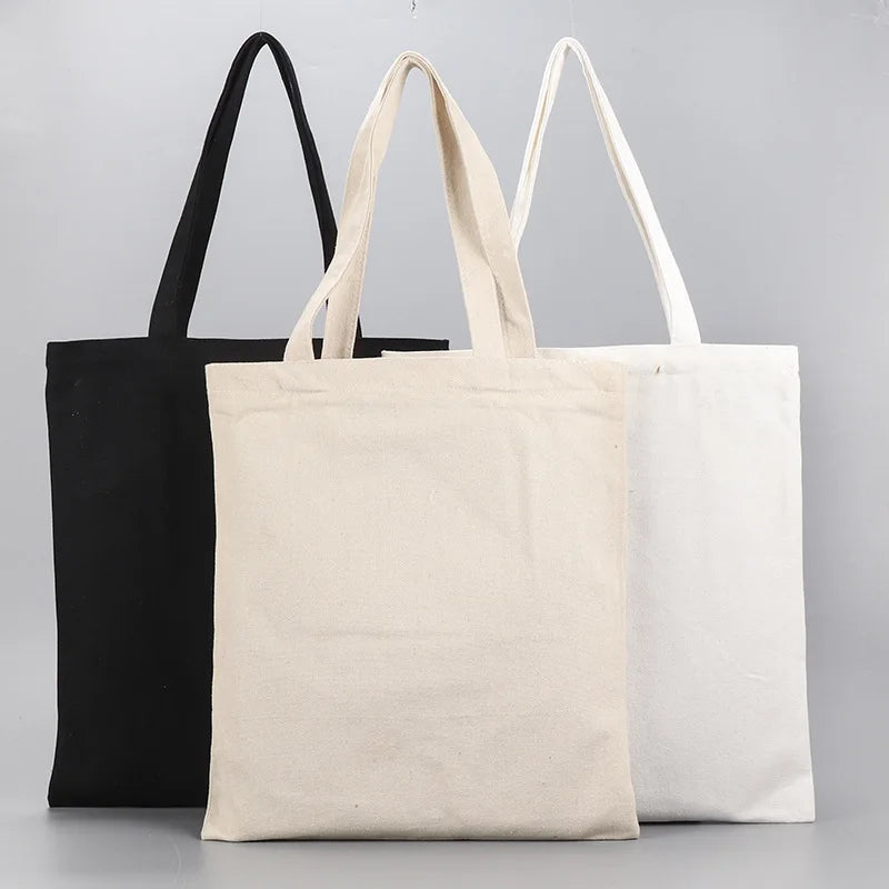 sac main toile réutilisable noir blanc beige classique uni opacité poignées respectueux environnement multifonction