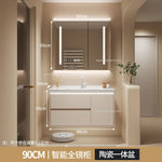 meuble salle bain moderne évier tiroirs beige clair miroir lumineux tapis motifs cosmétiques dorés