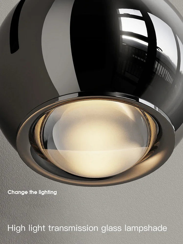 lampe murale réglable moderne argentée abat jour verre transparent minimaliste