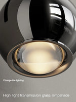 lampe murale réglable moderne argentée abat jour verre transparent minimaliste