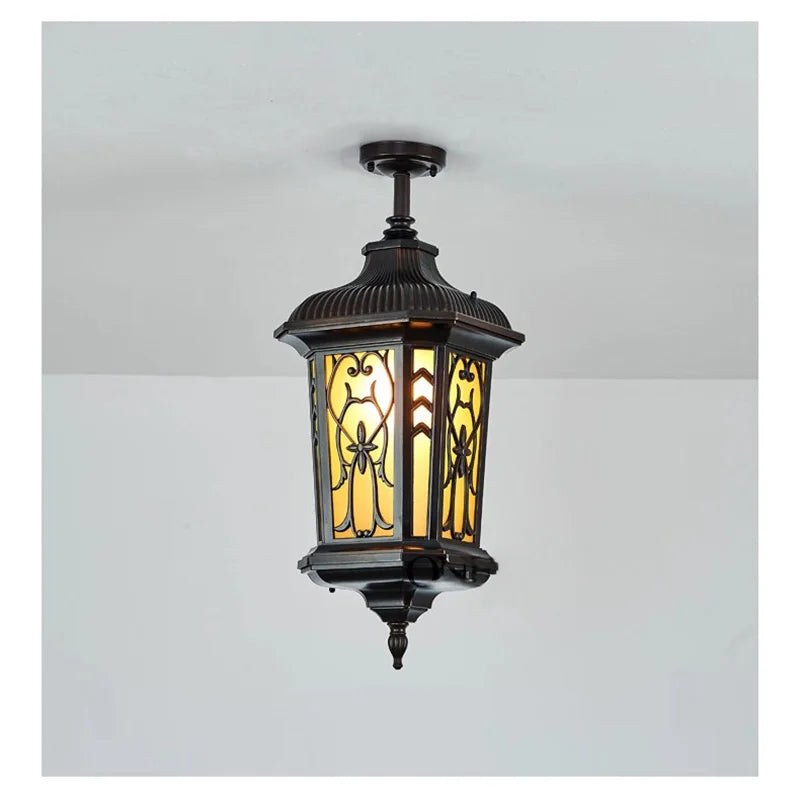 lampe rue classique verre teinté noir doré motifs floraux éclairage extérieur résistant intempéries
