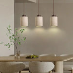 lampe suspendue moderne pierre texture granuleuse beige clair marron foncé éclairage salon chambre led