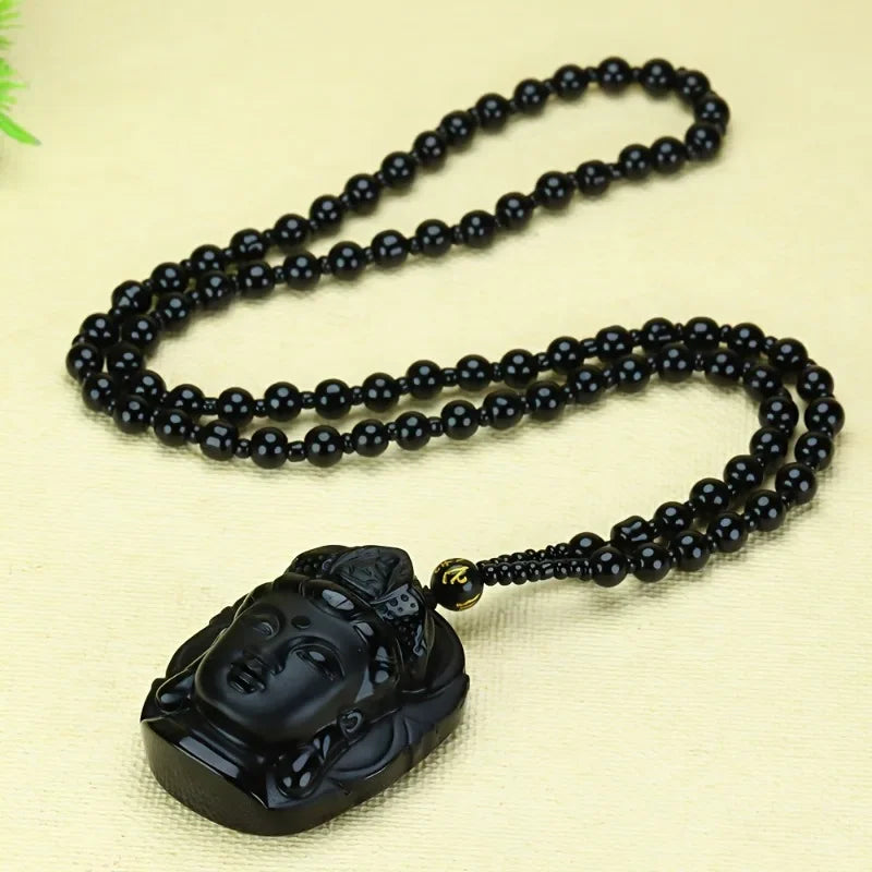 collier pendentif sculpté bouddha obsidienne noir artisanal cordon ajustable spiritualité