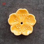 support bâtonnets encens fleurs stylisées artisanal rose bleu vert jaune blanc