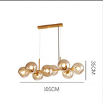 Suspension lumineuse or noir sphères transparentes moderne ampoules led