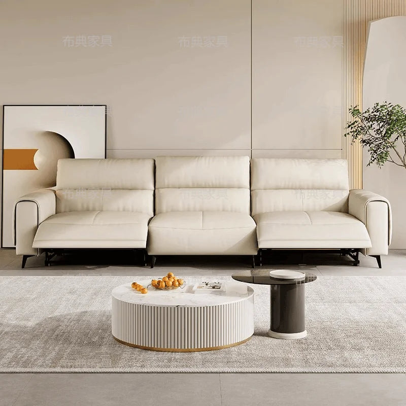 canapé lit simili cuir moderne beige repose pieds tablette intégrée minimaliste table rabattable salon
