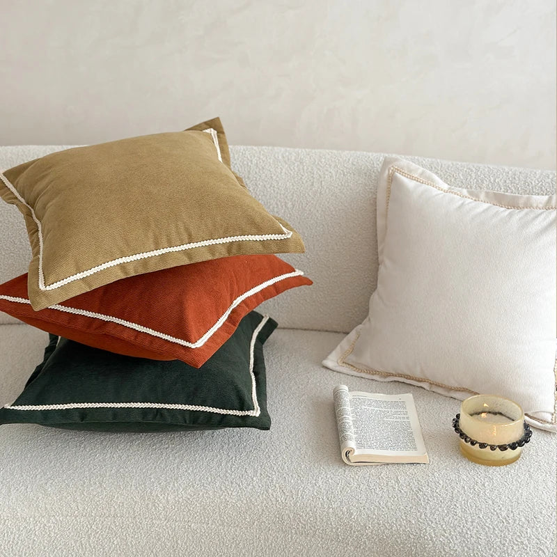 housse coussin décoratif carré couleur marron doré orange texture veloutée bord festonné scandinave minimaliste