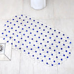 Tapis de bain antidérapant PVC dans une salle de bain élégante avec accessoires coordonnés