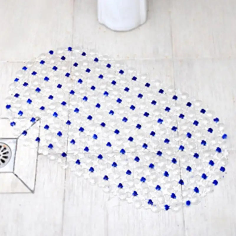 Tapis de bain antidérapant PVC dans une salle de bain élégante avec accessoires coordonnés