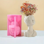 vase silicone forme buste humain blanc rose marron visage stylisé moderne
