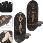 étagère murale noire dorée ornementations astrologiques pendeloques semi précieuses artisanal