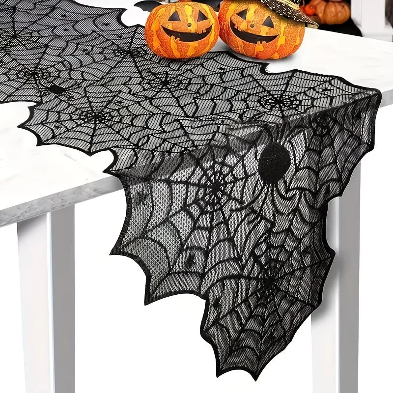 décoration halloween nappe toile d'araignée dentelle noire orange violet bougies citrouille araignées feuxilles