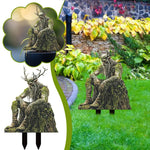 statue jardin artisanale feuilles racines mousse vert brun beige fantaisie extérieure noël