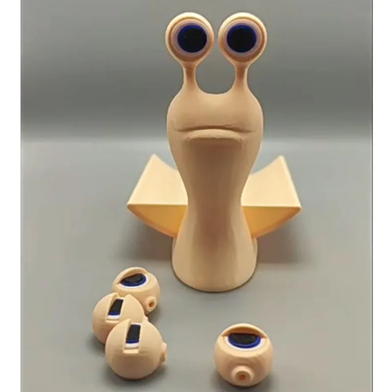 porte rouleaux toilette escargot forme moderne minimaliste décoration humoristique yeux bleus papier texturé