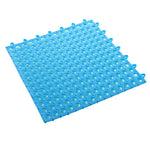 tapis salle bain modulable perforations texturées moderne jaune vert gris fixations noires éléments
