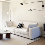 canapé moderne blanc texture douce pieds noirs oreillers minimaliste bois salon 180cm 78cm assemblage