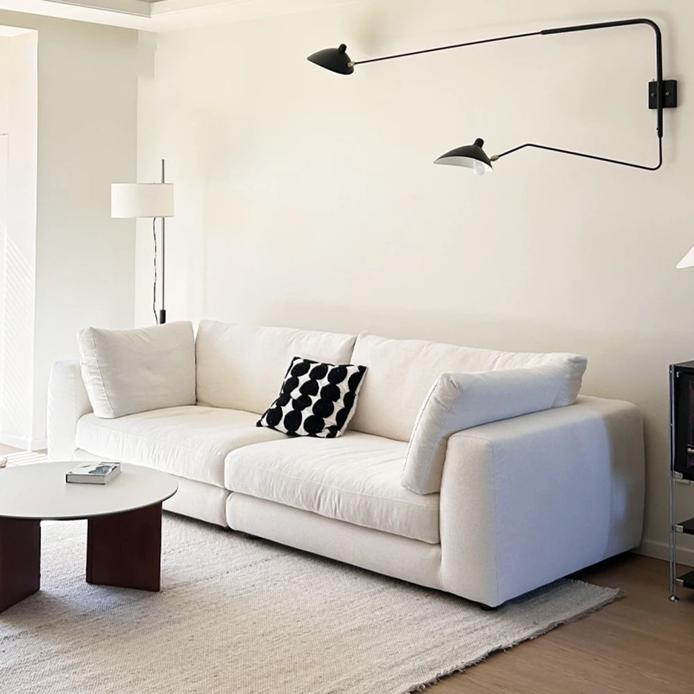 canapé moderne blanc texture douce pieds noirs oreillers minimaliste bois salon 180cm 78cm assemblage