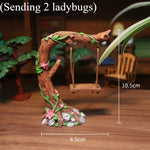 sculpture miniature artisanale arbres feuilles oiseaux balançoire pierres fleurs naturelextérieur jardin decoration résine