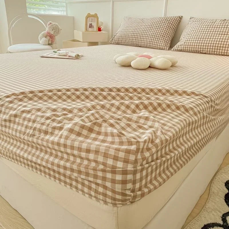 protège matelas carreaux bleu clair gris clair rose clair jaune clair vert clair classique