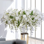guirlande florale artificielle fleurs clochettes roses feuilles vertes décoration élégante intérieure classique événement anniversaire