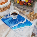 plateau décoratif planche découper statuettes vagues motifs abstraits bleu blanc rose vert