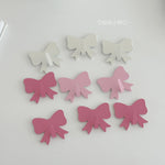 clips décoratifs nœuds blanc rose clair rose foncé modernes brillants sans perçage