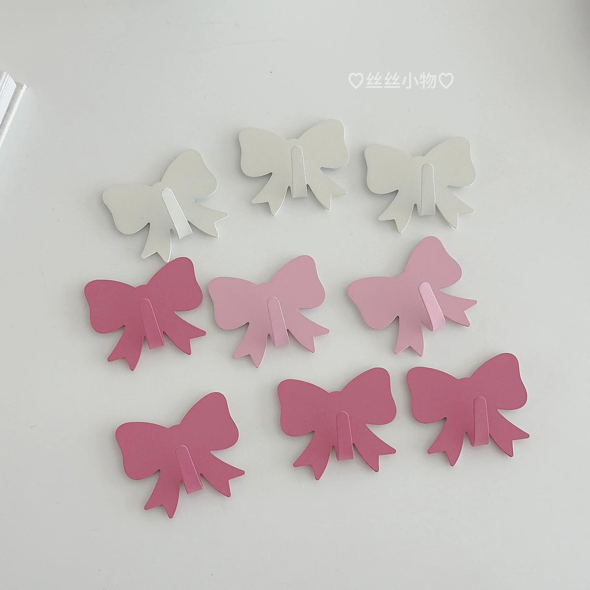clips décoratifs nœuds blanc rose clair rose foncé modernes brillants sans perçage
