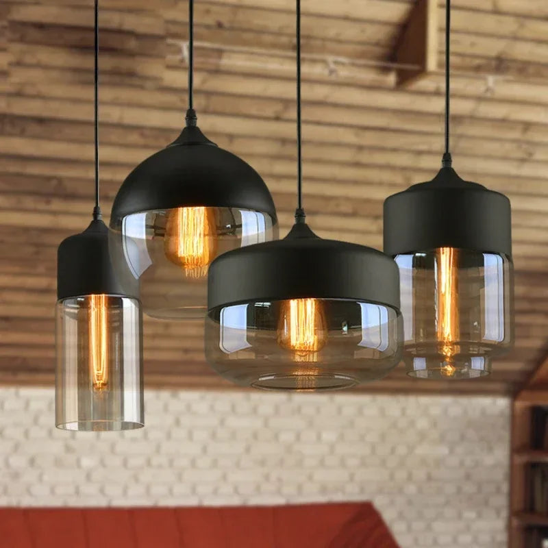 suspension lumineuse moderne pendentif verre noir transparent contemporain fixation câble luminaire salle manger chambre