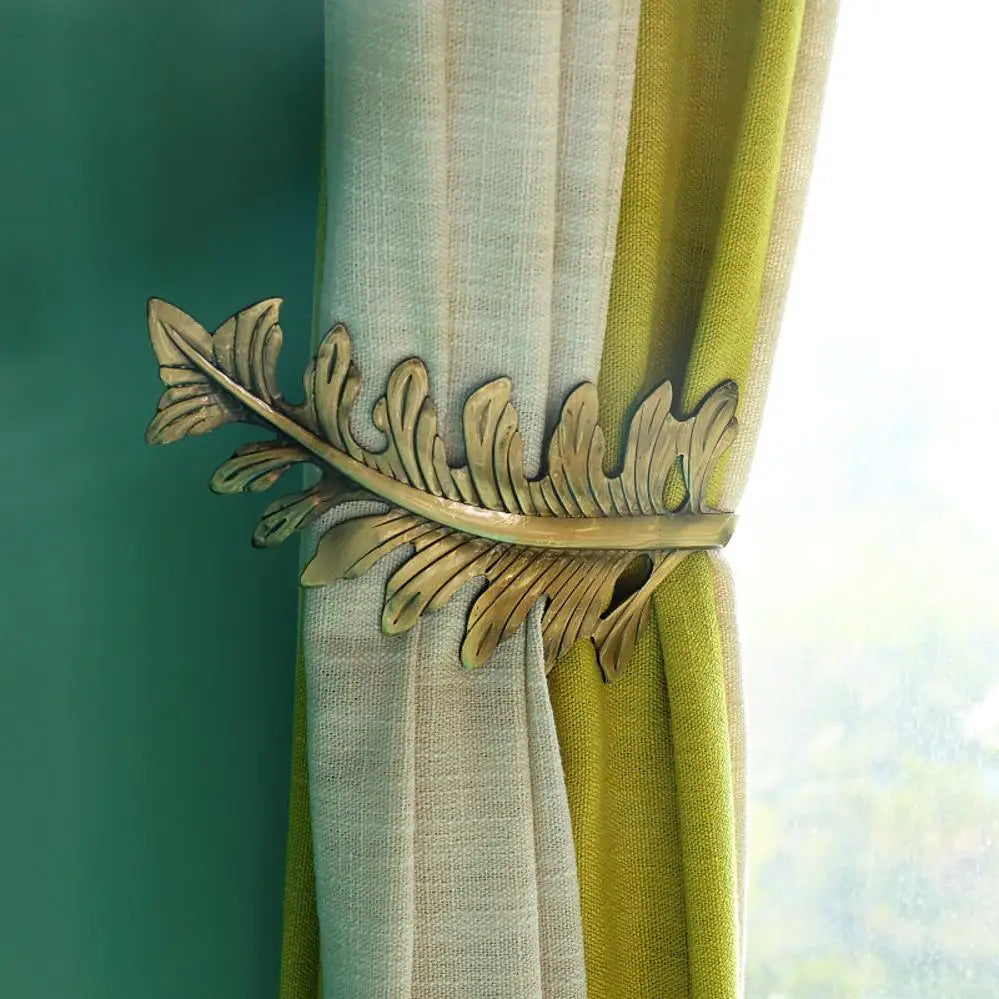 pince rideau métal moderne feuille stylisée argent doré cuivre opaque