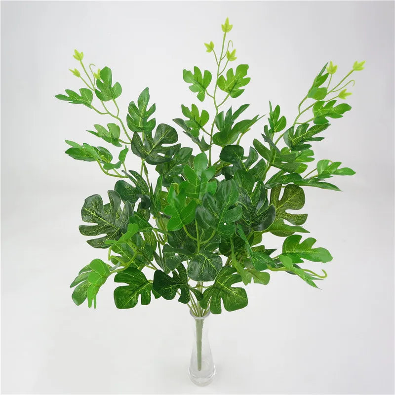 plantes artificielles violet vert marron feuilles ovales moderne décoration extérieure vase galets noirs blancs