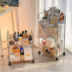 chariot roulettes transparent moderne filetage niveaux boîtes divers biscuits thé cosmétiques jouets