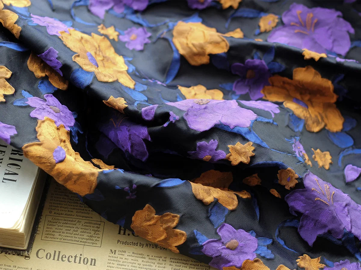 tissu semi transparent floral relief noir violet orange décoration couture jacquard polyester respectueux environnement