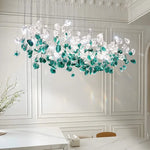 suspension lumineuse moderne gouttes cristal transparent verte ambrée 100cm 120cm 150cm