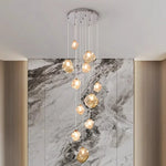 Suspension lumineuse moderne dorée noir formes géométriques brillantes salon chambre