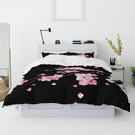ensemble literie moderne housse couette noir rose clair taies d'oreiller fleurs cerisier satinées queen