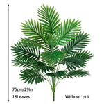 plantes artificielles vertes feuilles larges moderne decoration intérieure feuilles nervures perforations racines apparentes minimaliste
