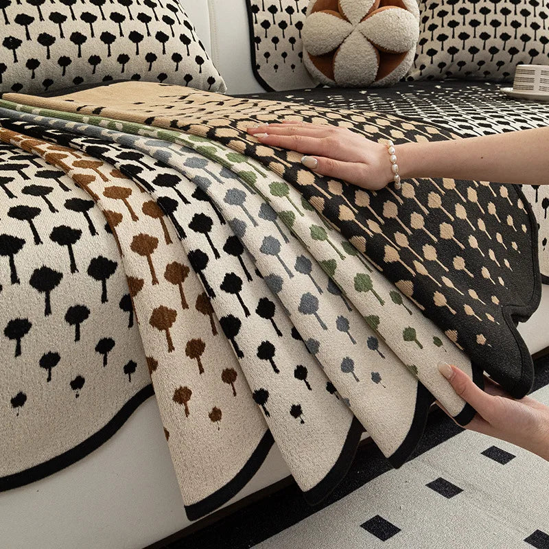 Cette image montre un motif de points de différentes tailles et de différentes couleurs, formant un design géométrique intéressant sur un textile.