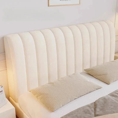 Housse de tête de lit en velours doux épais gris clair sur un lit