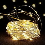 guirlande lumineuse flexible led jaunes vases fleurs séchées papier kraft maquette bateau cheval bascule