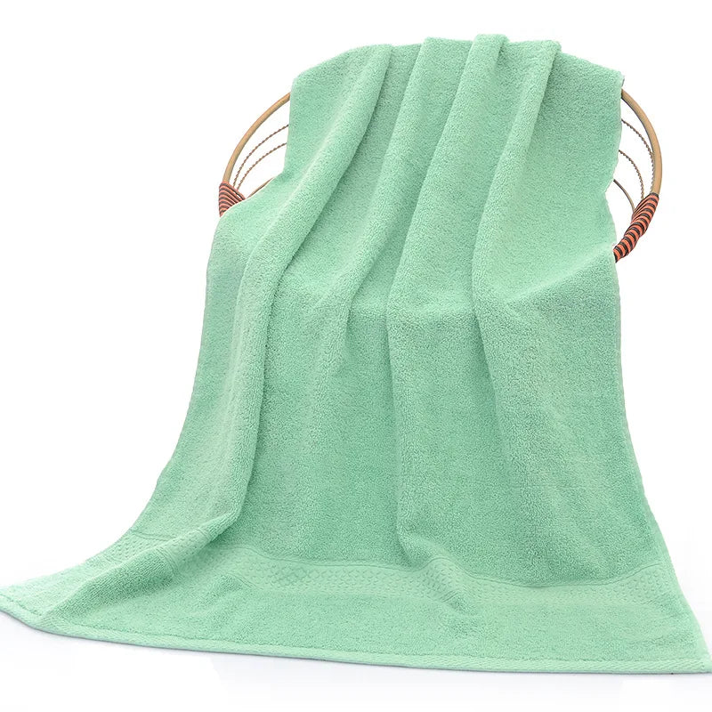 serviette bain coton épais texture tissée motif géométrique clips bois salle bain