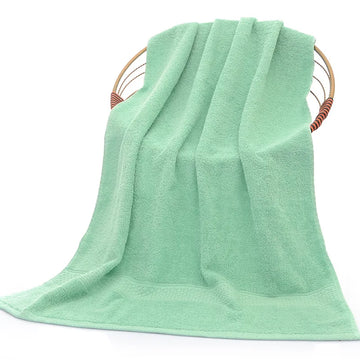 serviette bain coton épais texture tissée motif géométrique clips bois salle bain