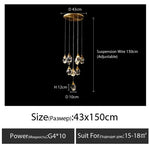 suspension lumineuse moderne transparente dorée facettes géométriques élégante leds