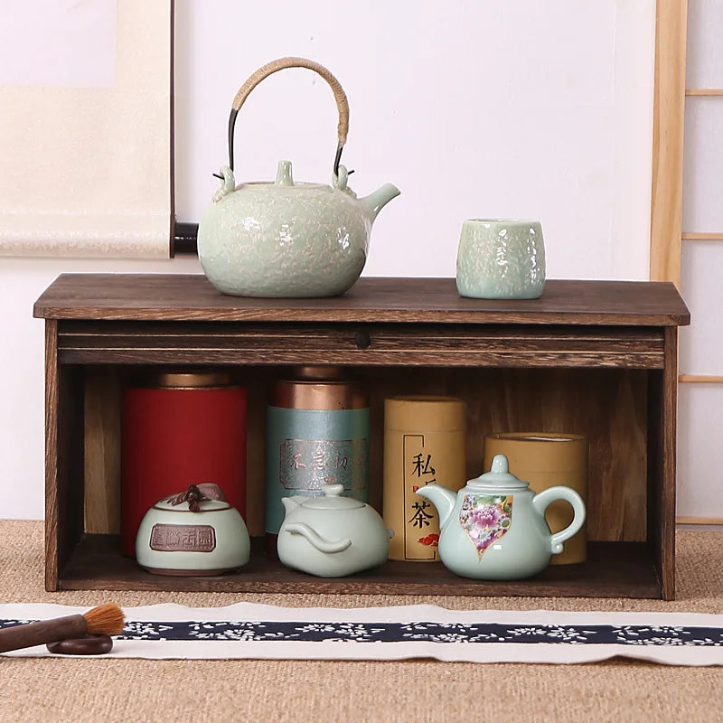 présentoir thé rustique meuble bois rangement tasses théière calligraphie zen asie tapis motifs floraux