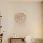 horloge murale pierre texturée minimaliste éclairage salle manger contemporaine fixée mur LED tricolore